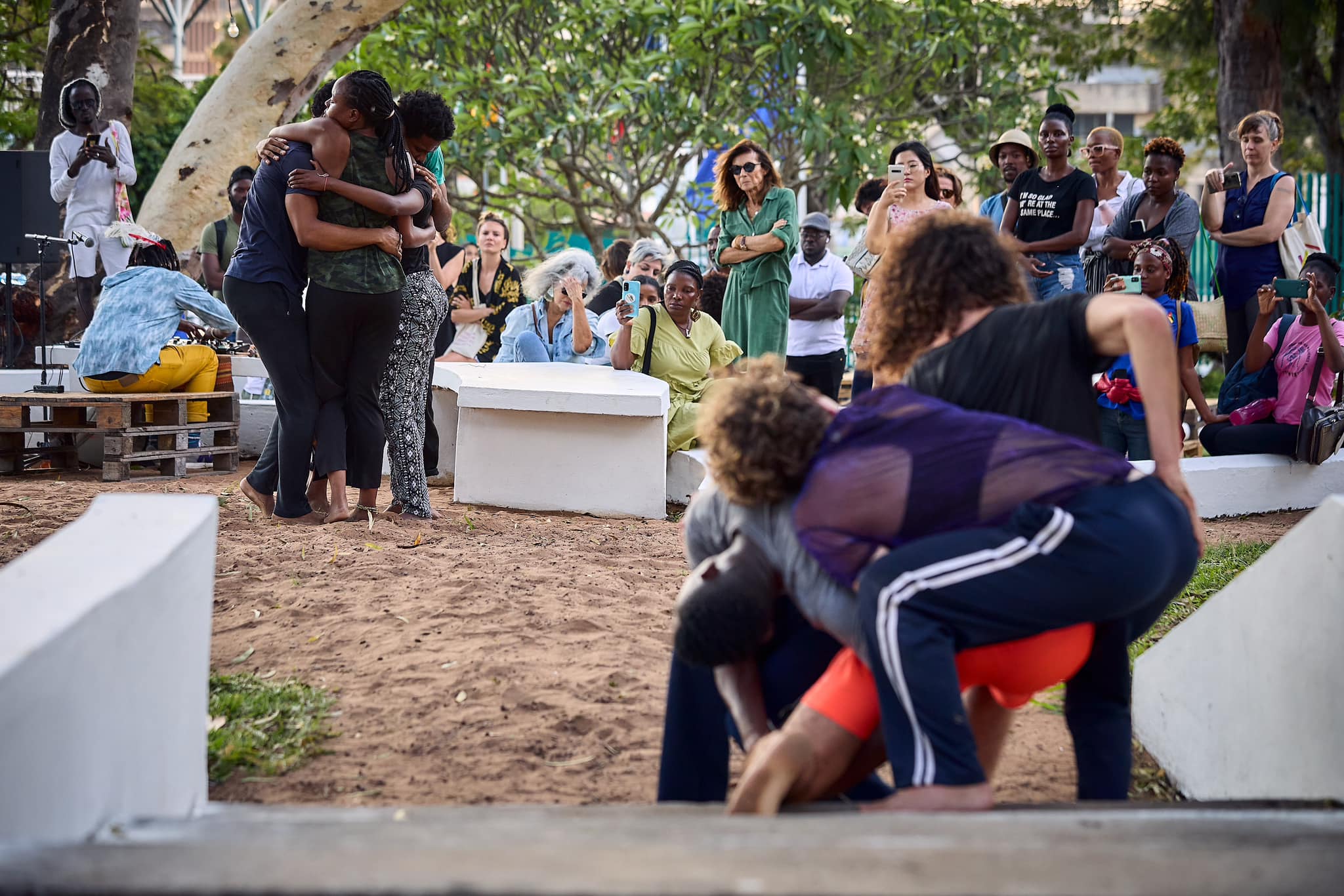 Matilda dancing next to sculpture